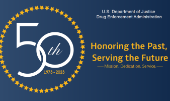 A blue and gold flag commemorating DEA's 50th anniversary.