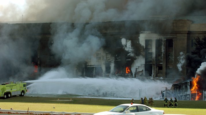 Firefighters battle flames at the Pentagon site. National Archives.