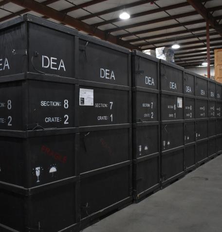 A line of black storage crates.