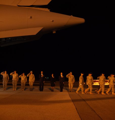 President Barack Obama, DEA Administrator Michelle Leonhart, and military personnel receive the remains of the fallen DEA agents and U.S. military personnel at Dover AFB in October 2009. U.S. National Archives and Records Administration.
