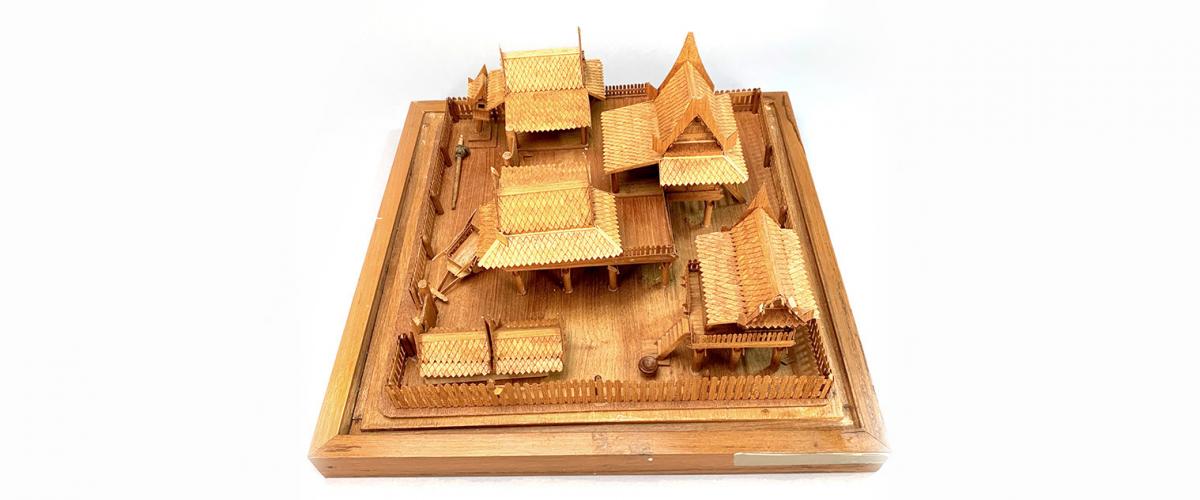 A wooden Thai village model