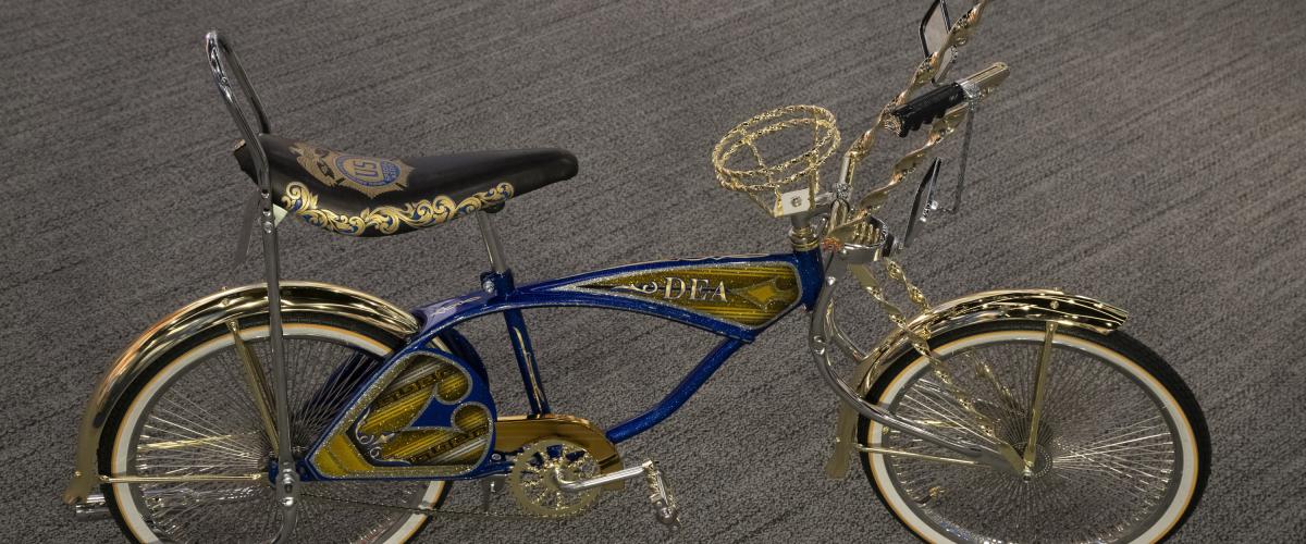 blue and gold lowrider bike