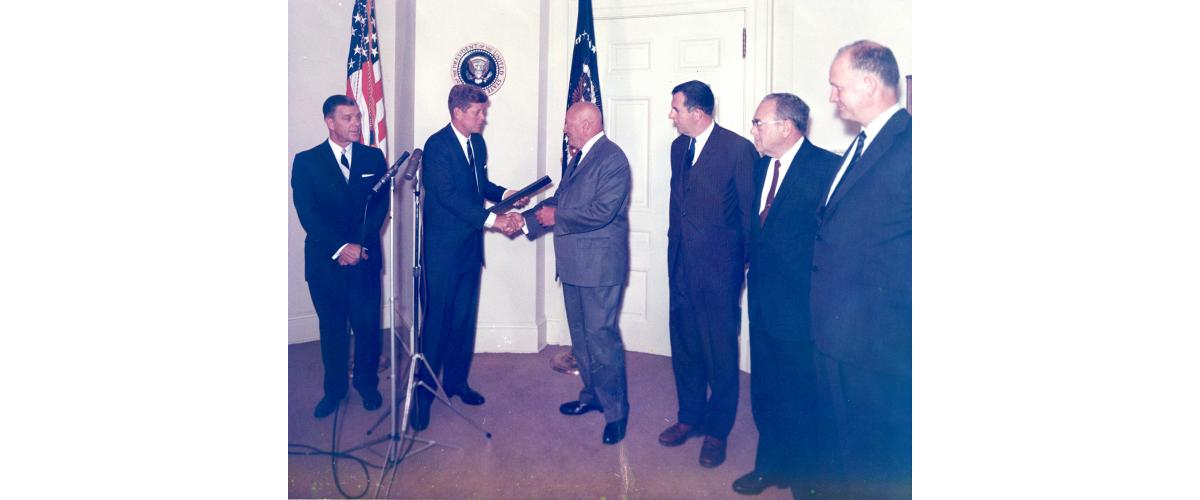 President John F. Kennedy presenting an award to Harry J. Anslinger