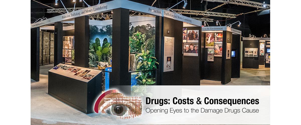 A photo of booths in the exhibit Drugs: Costs and Consequences. 