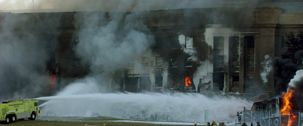 Firefighters battle flames at the Pentagon site. National Archives.