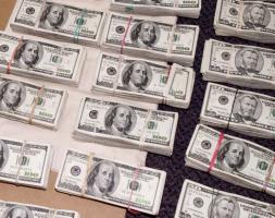 Bundles of cash seized from drug traffickers.