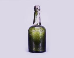 A green bottle that once contained Vin Mariani, a coca wine.