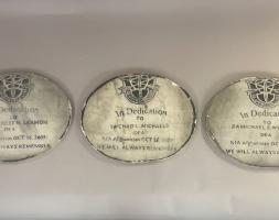 3 circular stones with names of three deceased special agents