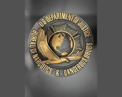 dark bronze plaque with BNDD seal